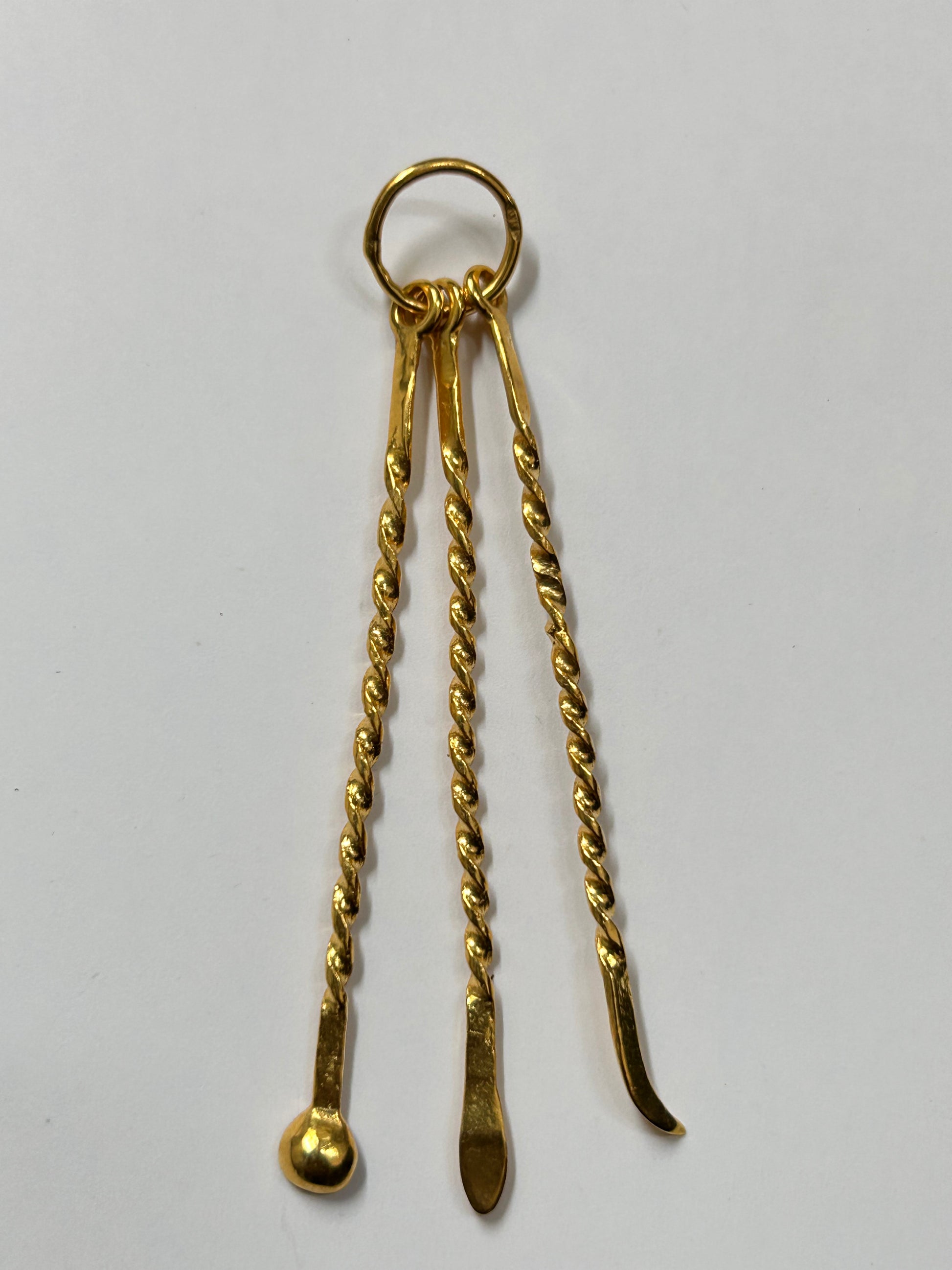 Pendentif cure-dent