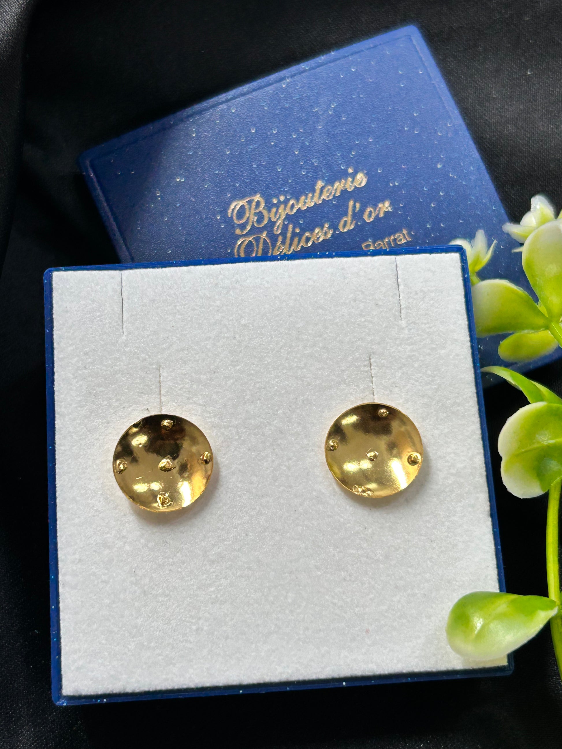 Boucle d'oreille bâté
