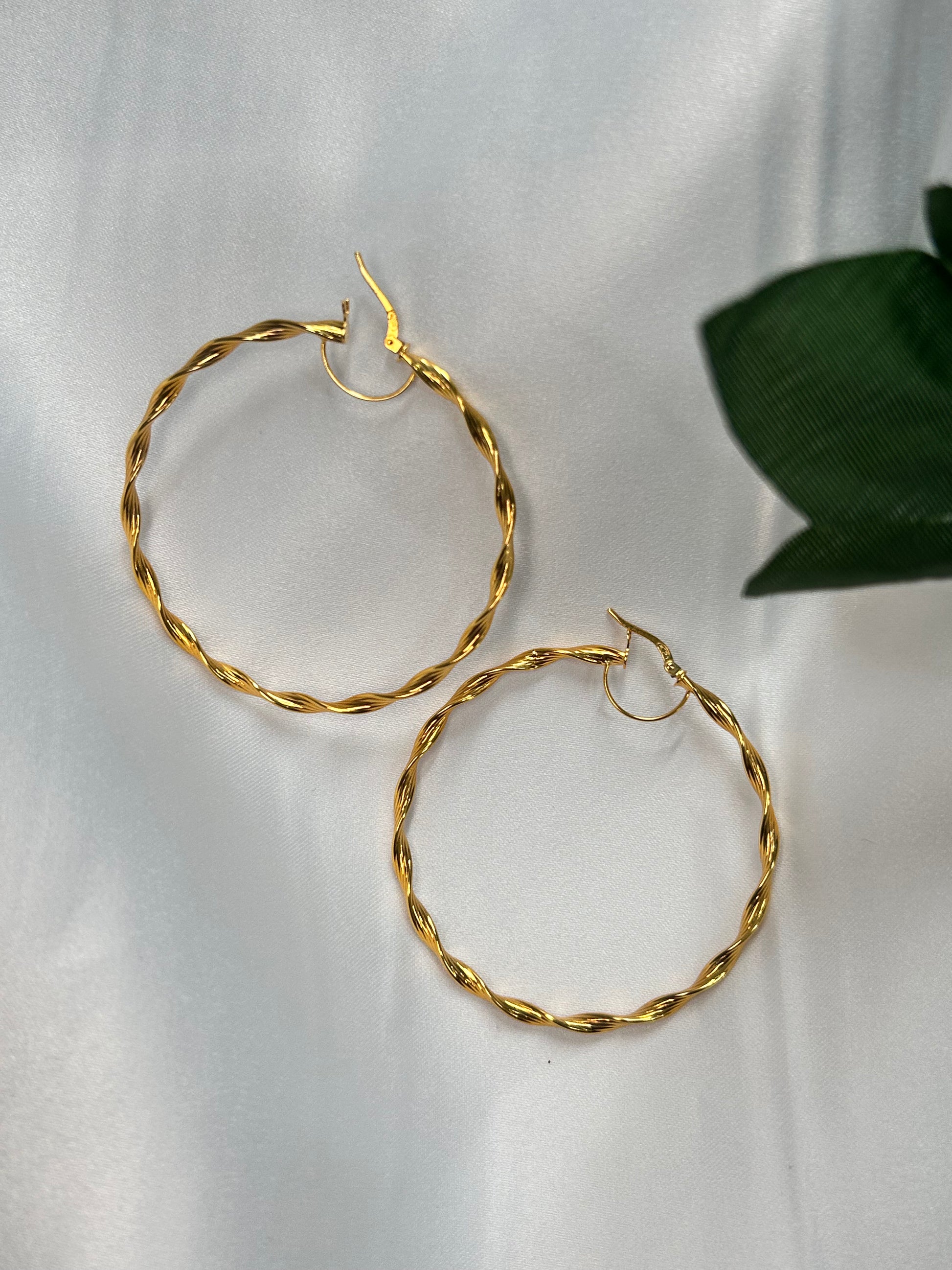 Boucle d'oreille créole en torsadée