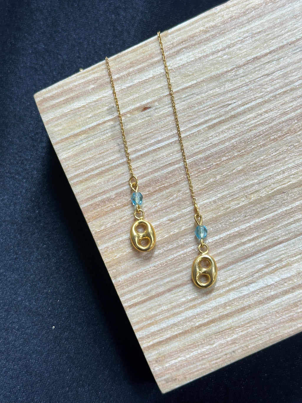 Pendante graine de café à grenat bleu